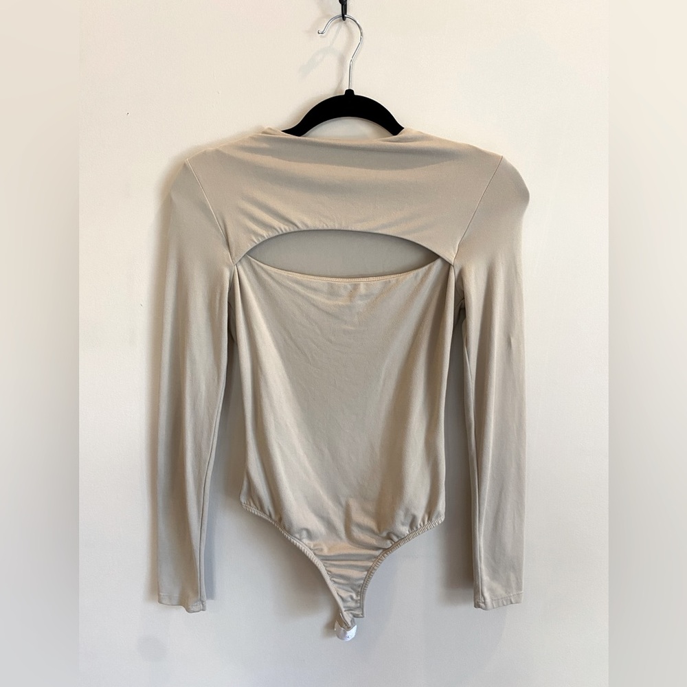 Beige long sleeve bodysuit
